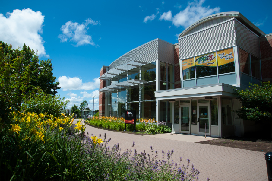 The UPEI Health and Wellness Centre is located in the W.A. Murphy Student Centre A building on a sunny day