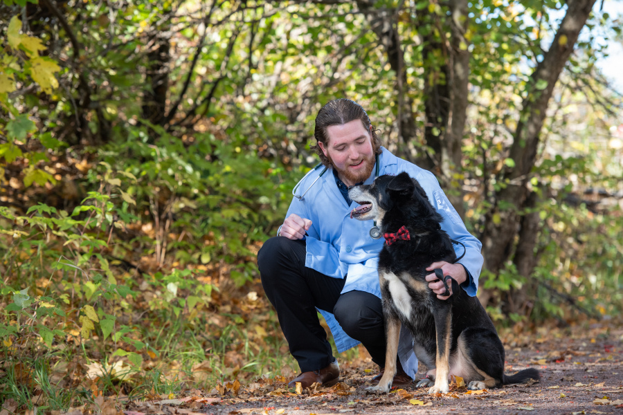 AVC student Nicholas Johnston and canine friend Kiba