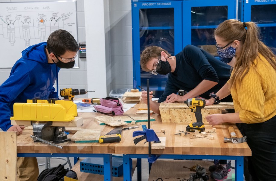 Sustainable design engineering students working on a project