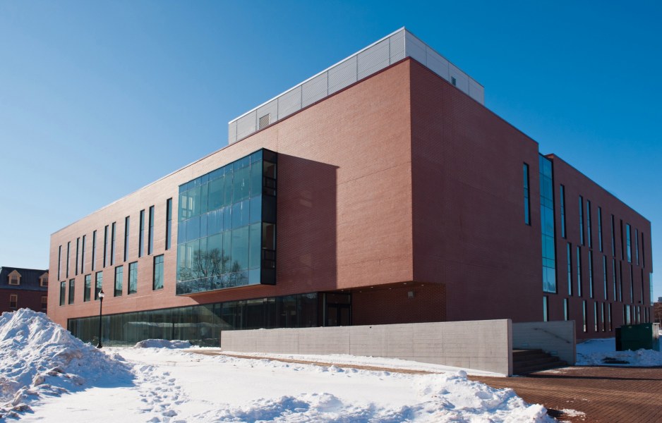 A large institutional building of brick and glass