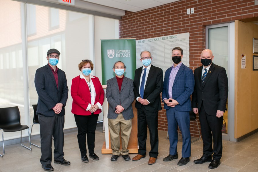 group of people wearing masks