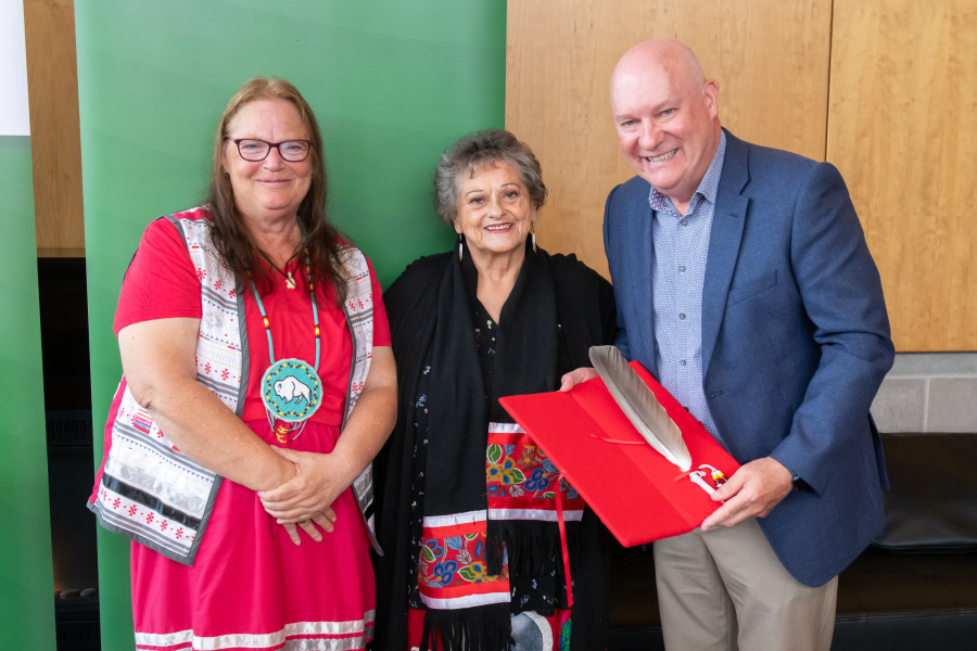 Lisa Cooper, President and Chief of the Native Council of PEI, Elder Georgina Knockwood Crane, and Dr. Greg Keefe, interim President and Vice-Chancellor at UPEI