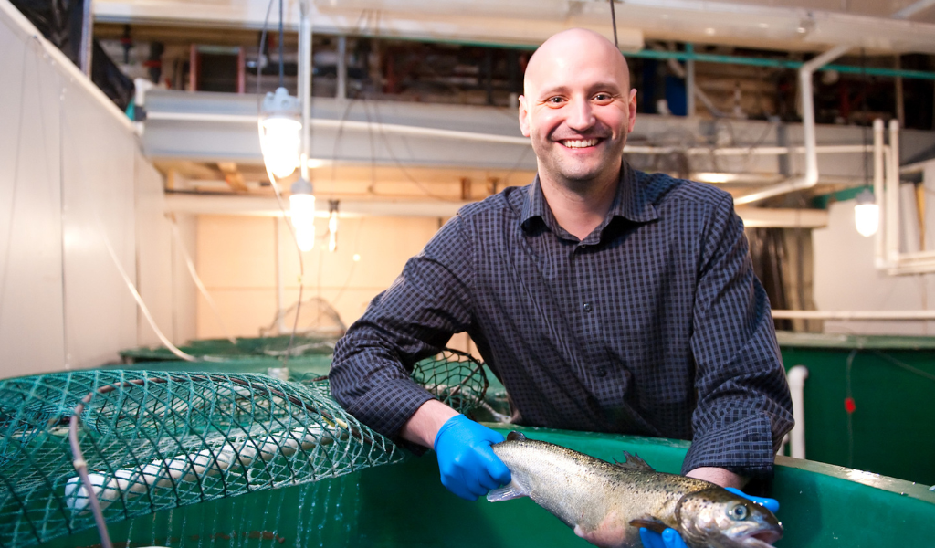 Dr. Mark Fast with a salmon