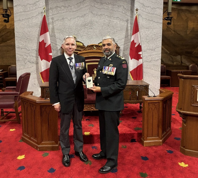 Dr. Christopher McCreery (left), Deputy Chancellor of the Order of St. John for the Priory of Canada and Vice-Chair of St. John Ambulance Canada presented Dr. Trevor Jain (right) with the Order of St. John on June 21 at the Senate of Canada Building, Ottawa. 