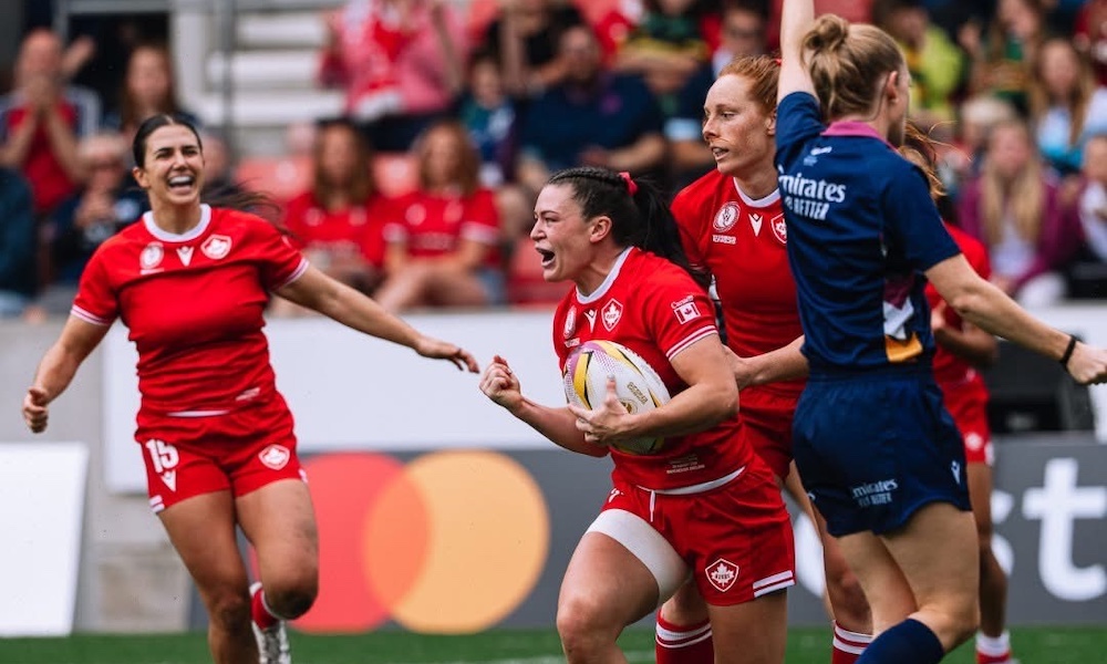 Team Canada rugby athlete Alysha Corrigan celebrating with teammates