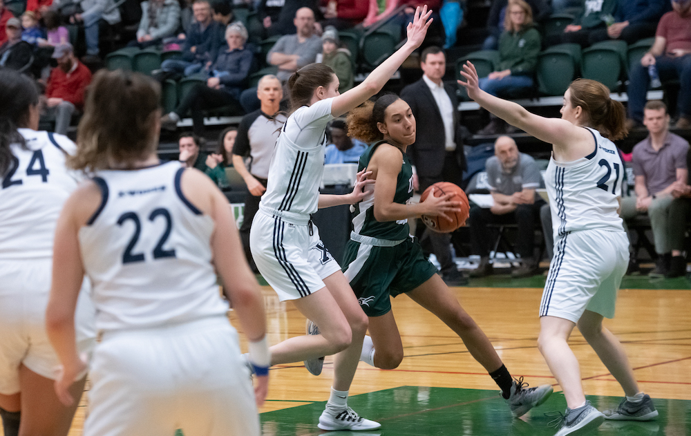 UPEI student and basketball guard Lauren Rainford playing basketball