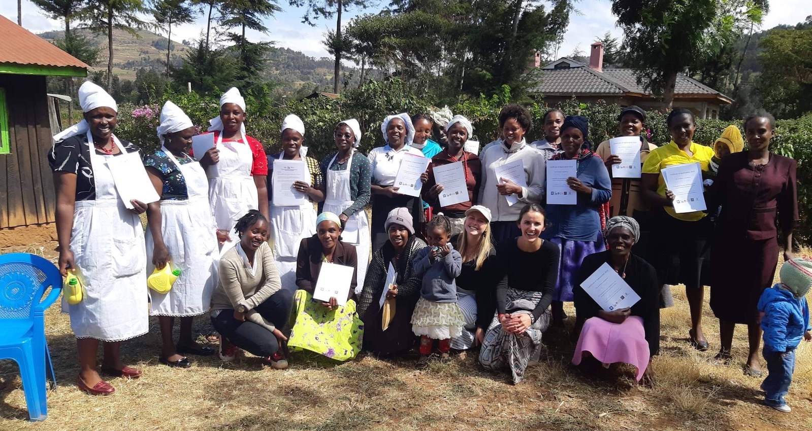 UPEI students Haley MacKenzie and Julia Heckbert with women in Kenya