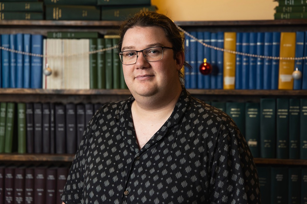 UPEI History student Riley Drake in the History student lounge