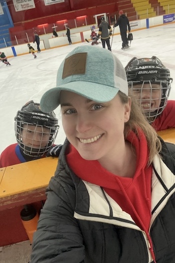Rhea Fisher coaching at a arena
