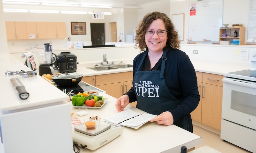 a dietitian in a commercial kitchen