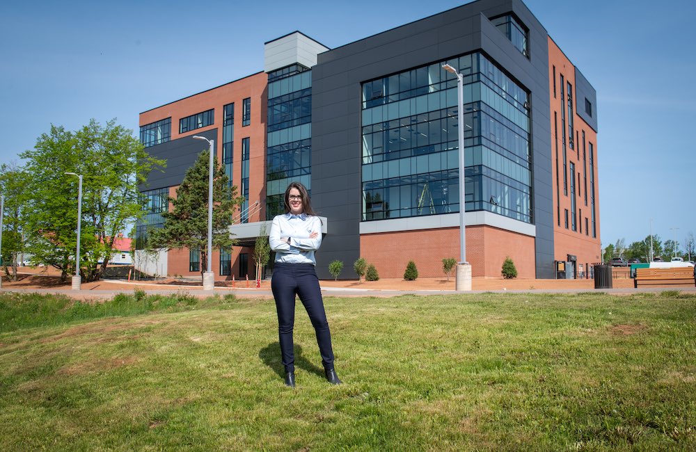 Dr. Aleisha Murnaghan standing outside the newly-constructed UPEI collaborative health centre