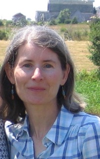 A photo of a woman with long dark hair