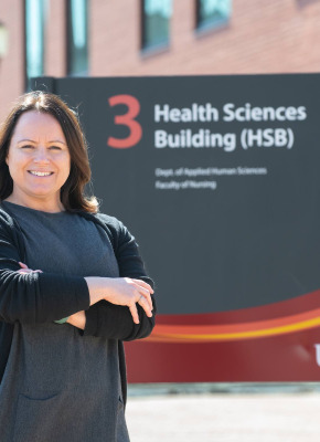 UPEI grad student and instructor Bethany Vessey by the Health Sciences Building