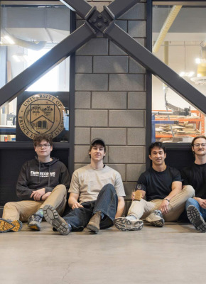 four engineering students in the Faculty of Sustainable Design Engineering building