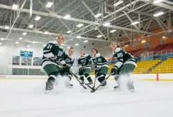 Five female hockey players