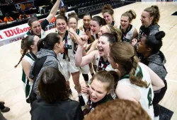 UPEI's women's basketball team celebrates its big win