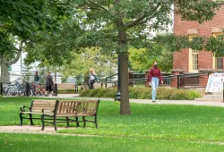 photo of student walking with mask