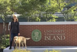 Eva MacNeill poses outside of the Atlantic Veterinary College during Open House, a tradition she has held since she was five years old. 