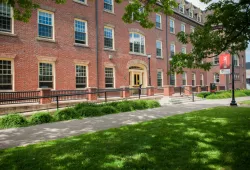 Photo of SDU Main building with welcome banner in foreground