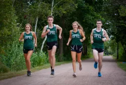 UPEI Cross Country Panthers (Grace Richard, Jack Roberts, Katie Richard and Riley Fitzpatrick) prepare to kick off the season