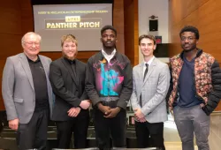 From left to right:  H. Wade MacLauchlan (representing the family of Harry W. MacLauchlan), Evan Hutchinson (Harvest Moon Blueberry Syrup), Jerry Oriade (Finix), Matt Jelley (Mobile Bike Services), and Chinemerem Mbonu (Skibble).