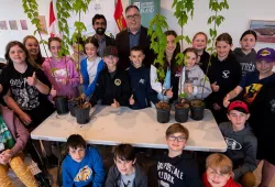 a group of students with Dr. Farooque and Minister Myers