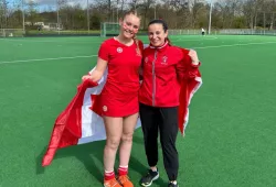 U17 female field hockey Team Canada player Ellie Mullins and assistant coach Lacey MacLauchlan.