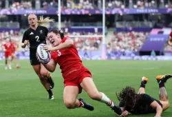 Alysha Corrigan #3 of Team Canada scores her team’s second try while under pressure from Portia Woodman-Wickliffe #11 of Team New Zealand. (Photo by Michael Steele/Getty Images)  