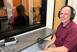 Dr. Étienne Côté monitors veterinary students during simulation training. 