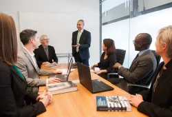 An EMBA professor lectures to students