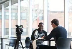 aclc student and professor discussing video script 