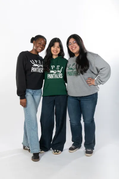 a group of students wearing UPEI-branded clothing