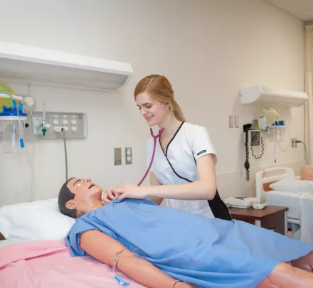 Nursing student in a mock scenario