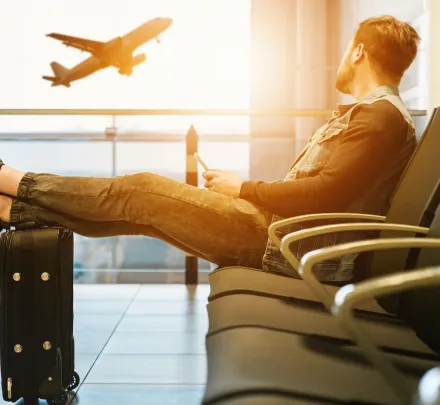 a traveller waiting for a flight