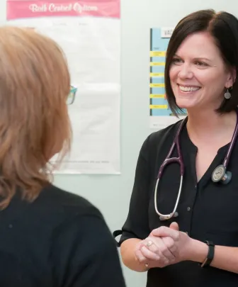 a nurse practitioner and patient at the UPEI health and wellness centre