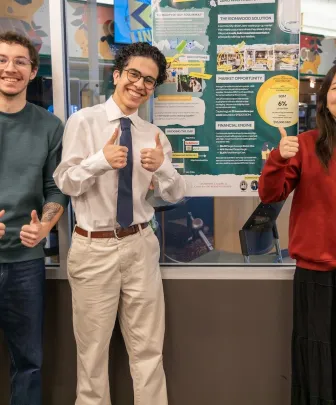 three students in the Catherine Callbeck Centre