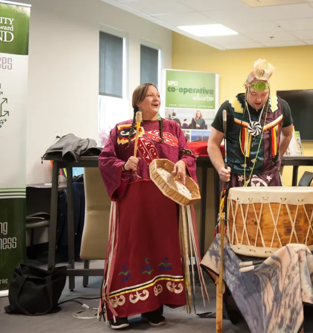 four drummers performing during the re-opening of dalton hall