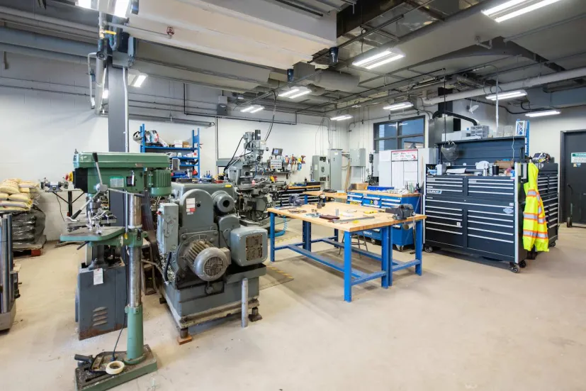 large machines in a shop area in the Faculty of Sustainable Design Engineering building