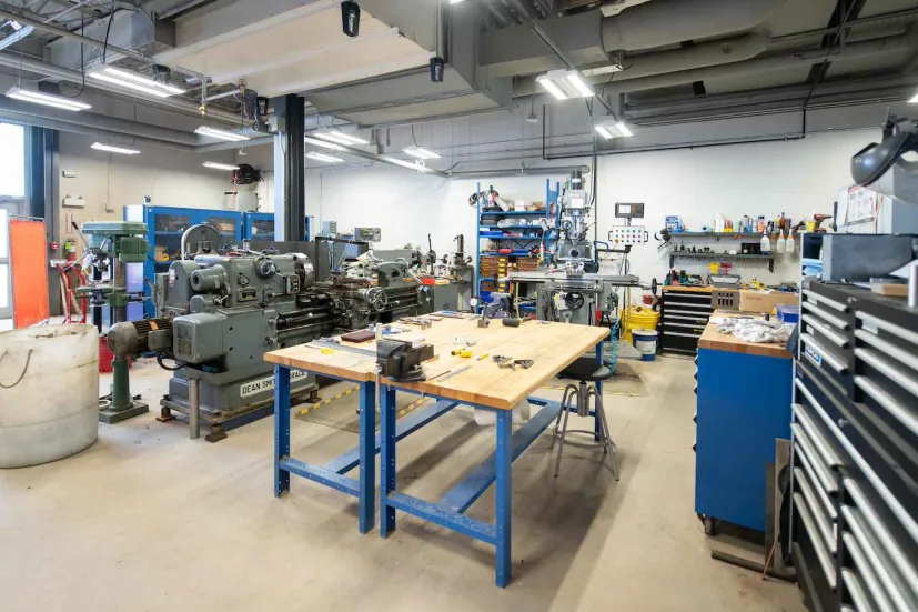 large machines in a shop area in the Faculty of Sustainable Design Engineering building