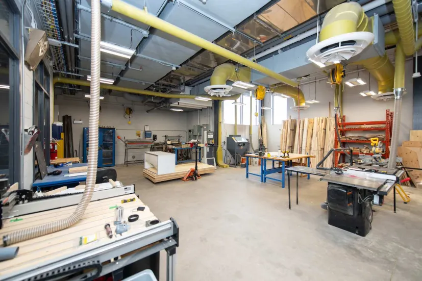 large machines in a shop area in the Faculty of Sustainable Design Engineering building