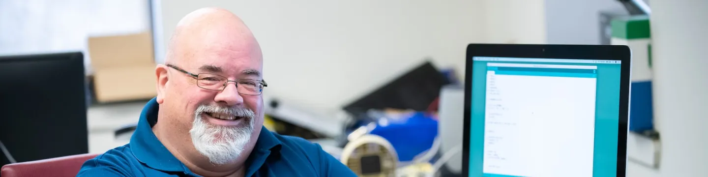 Chris Vessey in a computer lab