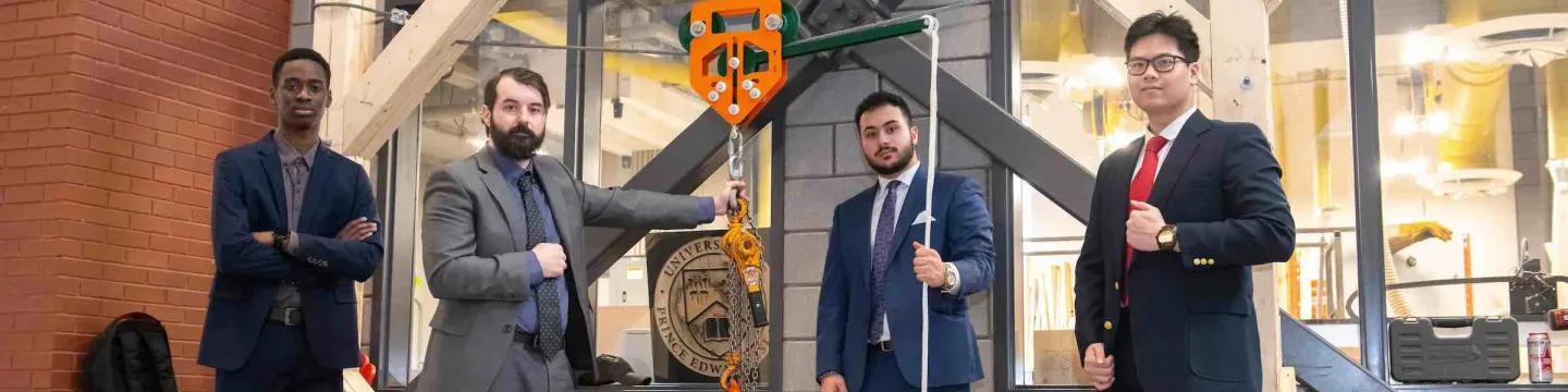 four engineering students and their second-year project