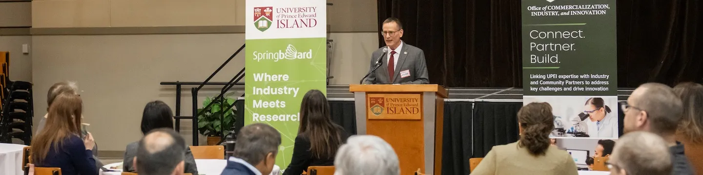 Dr. Greg Naterer speaking to an audience in UPEI's McMillan Hall