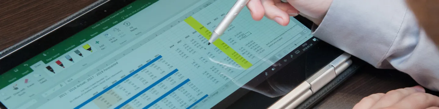 a spreadsheet displayed on a tablet