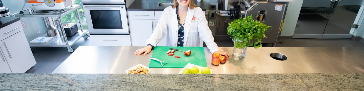 female food product developer in a kitchen