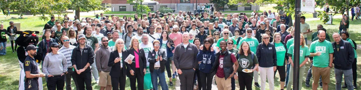 a large group of people outdoors in the UPEI quadrangle