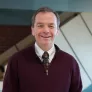 upei professor and researcher bill montelpare standing in health sciences building stairwell in background