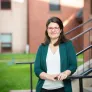 Dr. Magdalena von Eccher outside Steel Recital Hall at UPEI