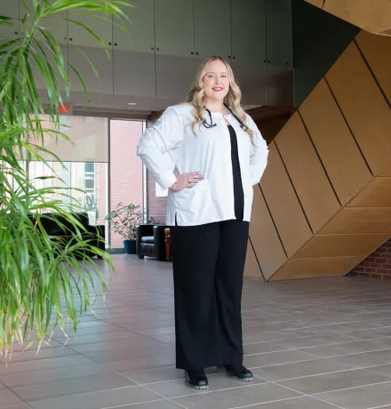 UPEI nursing student Kayla MacLeod in the foyer of the Health Sciences Building