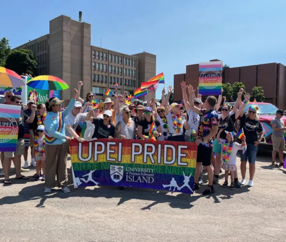 Photo of a group at the Pride Parade wearing colourful clothing